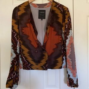 Fun light loose blazer from Anthropologie .